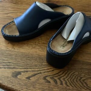 Naot Rome slide in Polar Sea leather.